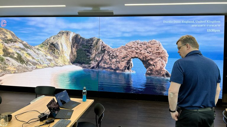 Main screen with client for scale - Interactive LED Walls - Immersive Studio