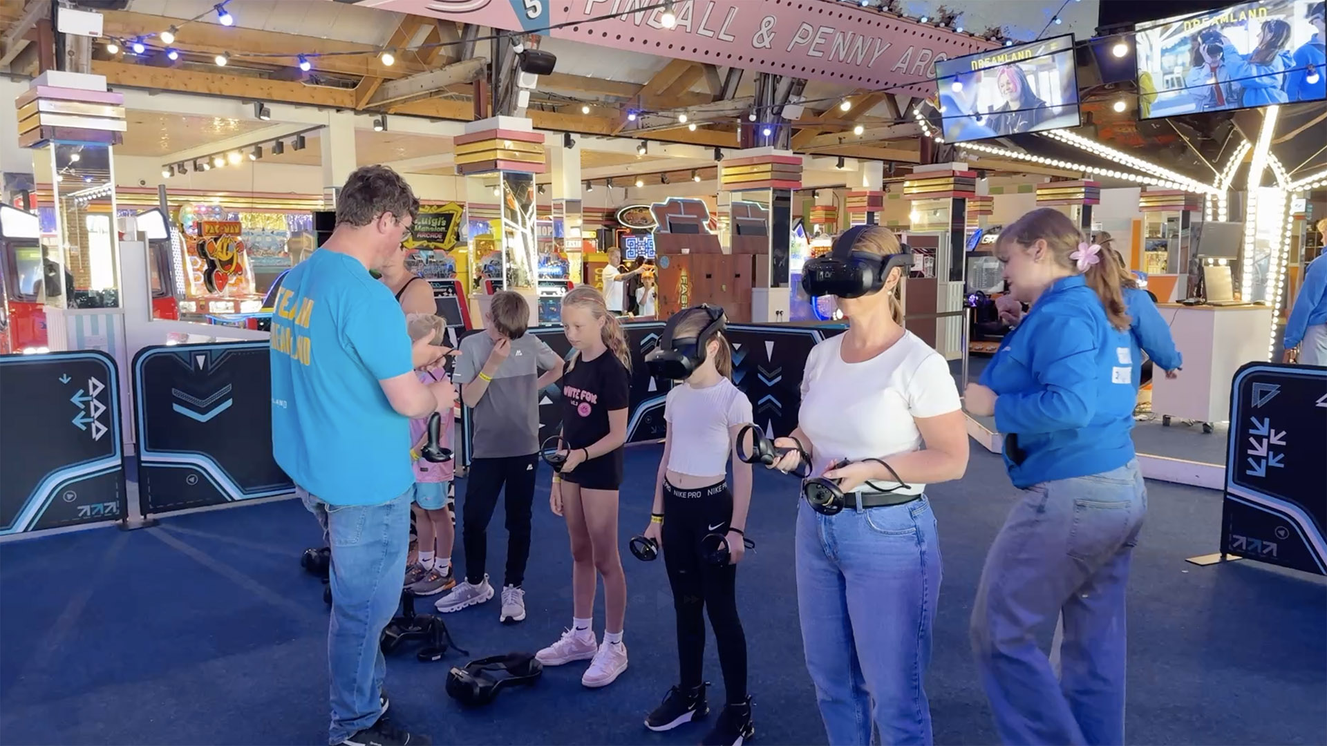 Group of people enjoying a free-roam virtual reality at Dreamland - Immersive Studio